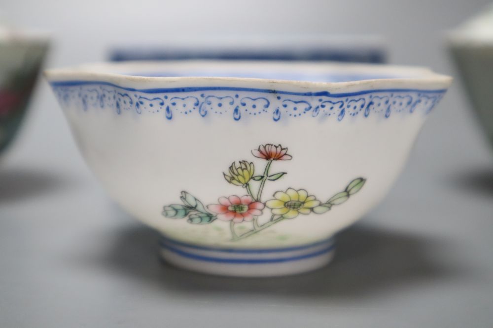 A pair of Chinese famille rose bowls and covers, late 19th century, a blue and white box and cover, 11cm and an eggshell bowl, 8cm